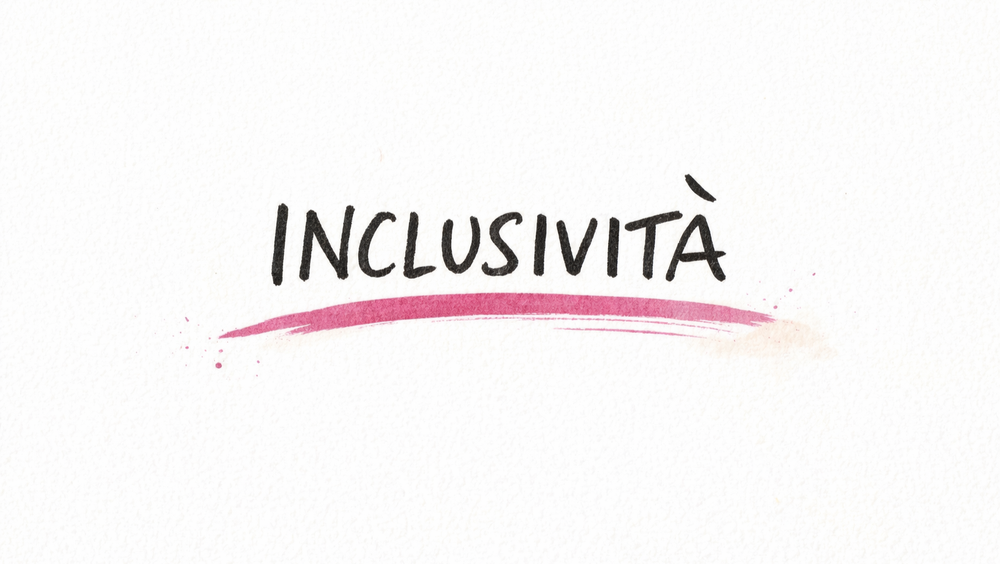 Illustrazione editoriale con la parola “Inclusività” scritta a mano su sfondo bianco, con tratto irregolare in inchiostro nero e sottolineatura magenta ad acquerello, in stile minimale.